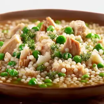 Parelcouscous met Kip en Doperwtjes