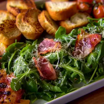 Pittige Rucola Salade met Gegrild Fruit en Pancetta