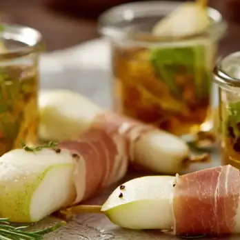 Grappa-gegaarde Peren met Spek