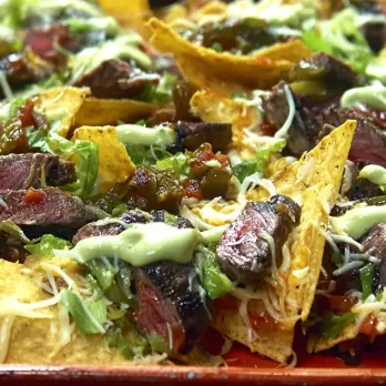Nacho's met Chile-Kruidenbiefstuk en Groene Chili