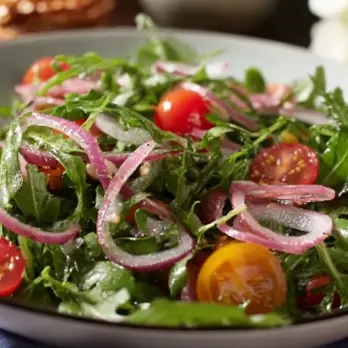 Rucola Salade met Rode Uien en Champagne Vinaigrette